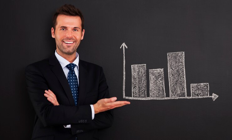 Smiling Businessman Presenting Graph Blackboard 329181 731